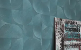 Grafische Tapete in Türkis Tönen