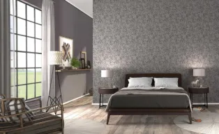 Schlafzimmer mit moderner Vliestapete in Taupe